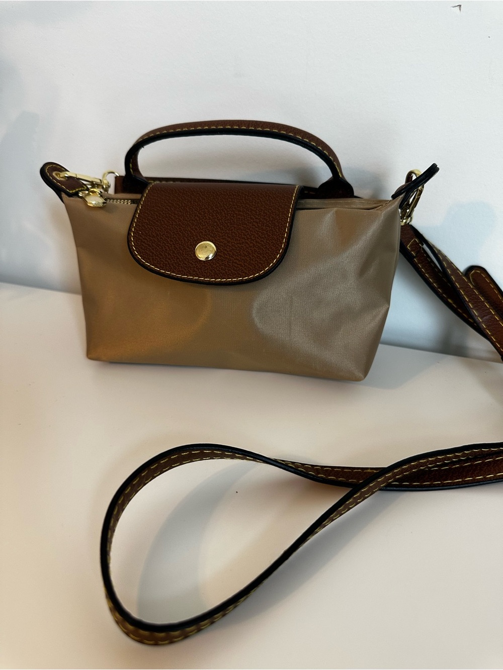 Compact Brown Crossbody Bag with Top Handle